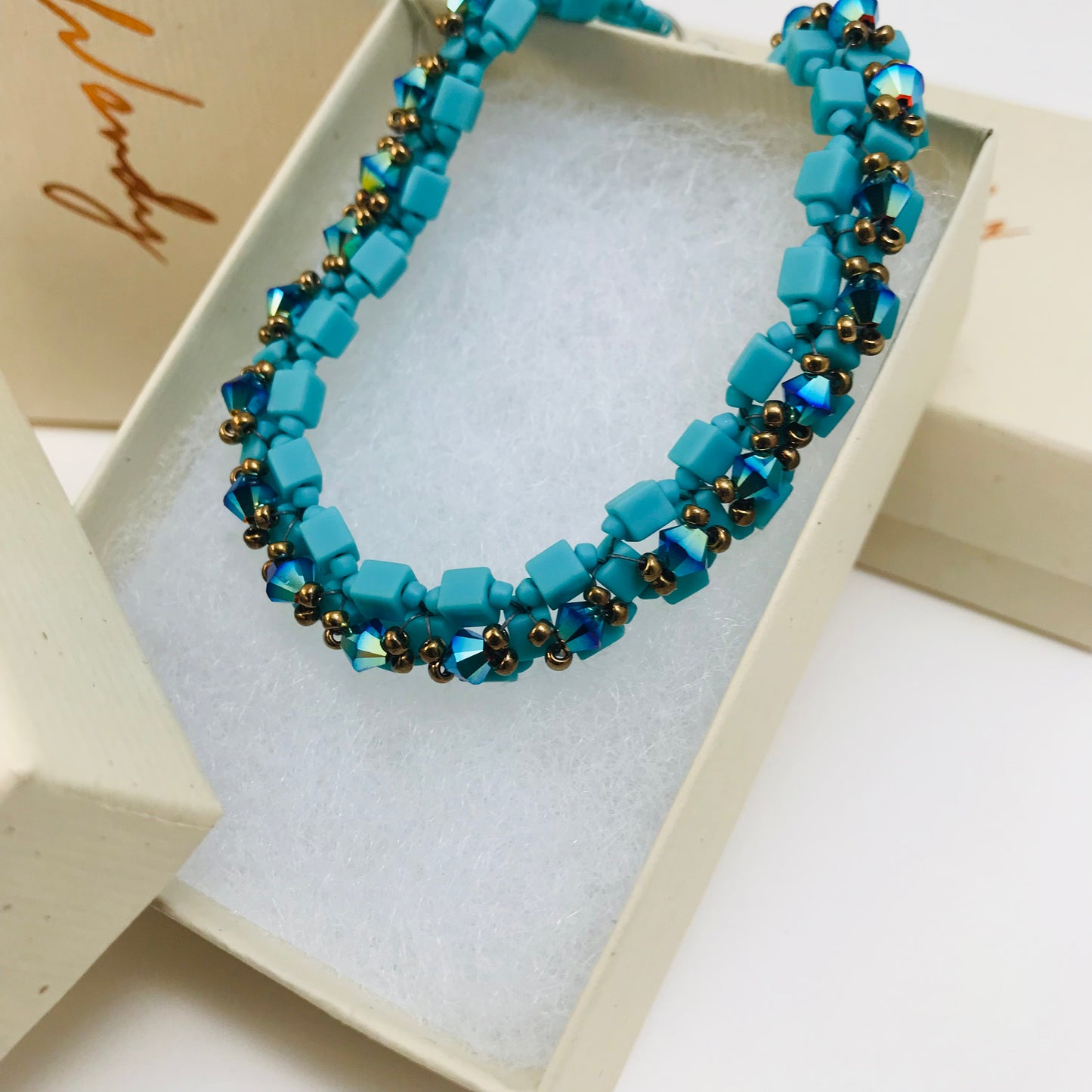 Matte Turquoise with rainbow Austrian Crystal Embellished Bracelet