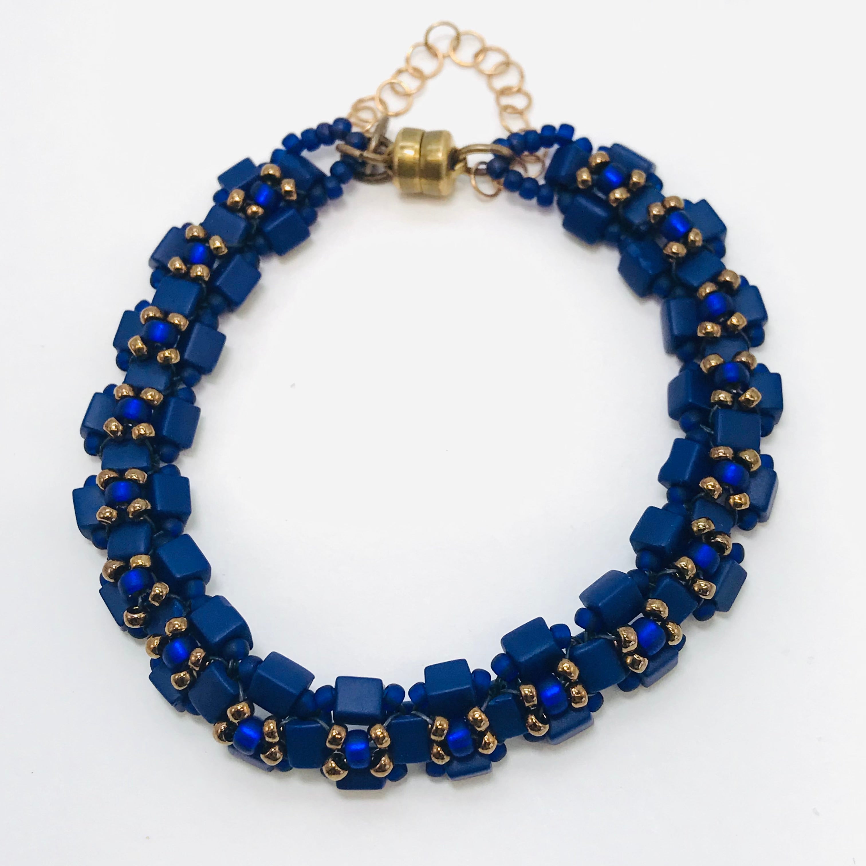 Brazilian bracelet with hypnotic pattern weaved with Miyuki Delicas 11/0  beads
